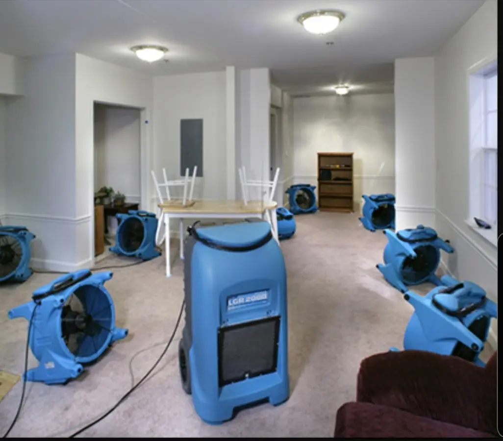 Air movers and dehumidifier setup for Water Damage Restoration in Highland Heights